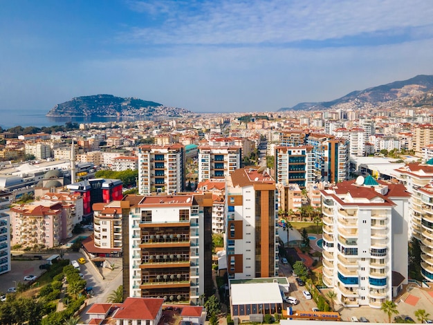 A view of a city with a mountain in the background