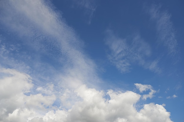 Below view of clouds with copy space in a blue sky during summer Low angle of a nature background copyspace cumulus clouds and sunshine Enjoying a beautiful afternoon and day outside in fresh air