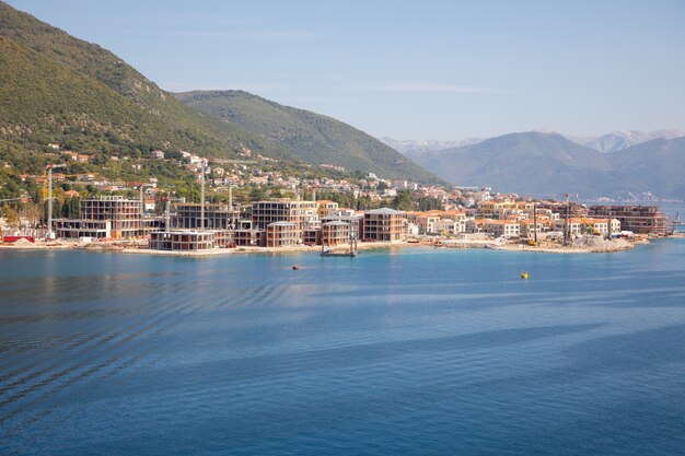 View of construction site of luxury buildings in town in Bay of Kotor, Montenegro