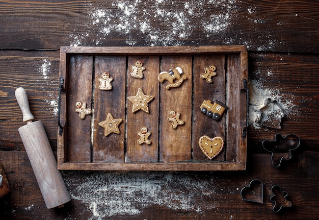 View on cookies and flour on a tray on table