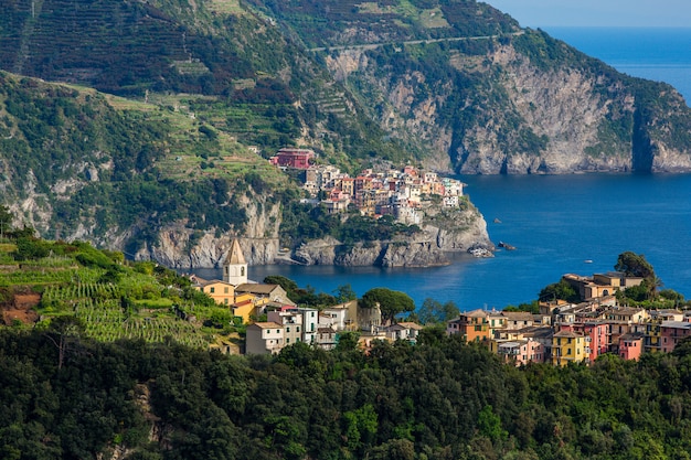 View of Corniglia and Manarola, colorful villages of Cinque Terre, Italy.