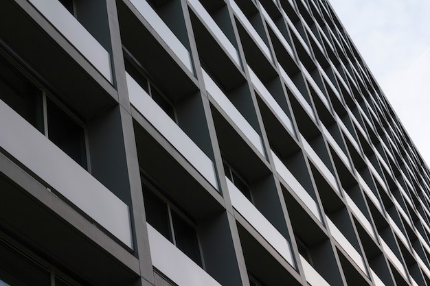 View of council flats. Exterior of complex building in the city. Urban environment