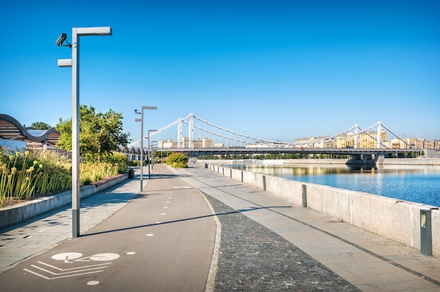 View of the Crimean bridge from the Crimean embankment of Muzeon in Moscow on a summer sunny morning