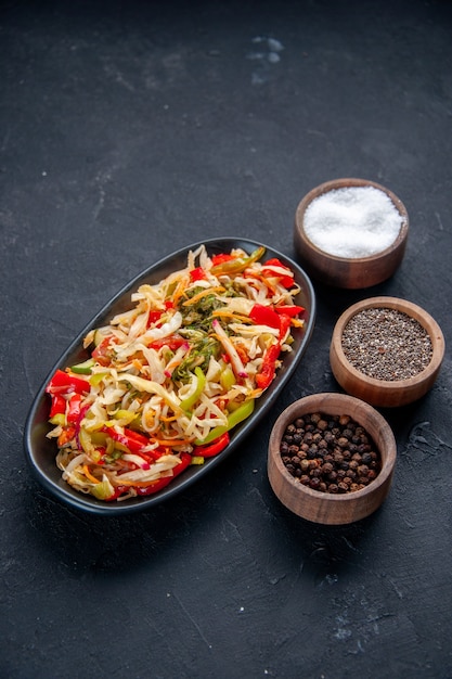 above view delicious pepper salad inside long plate with seasonings dark background meal diet dish horizontal colour food health bread