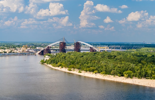 View of the Dnieper river with a bridge under construction in Kiev