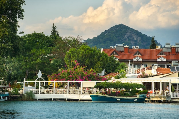 View of the embankment with boats and the canal in Dalyan.Turkey.