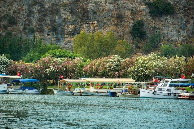 View of the embankment with boats and the canal in Dalyan.Turkey