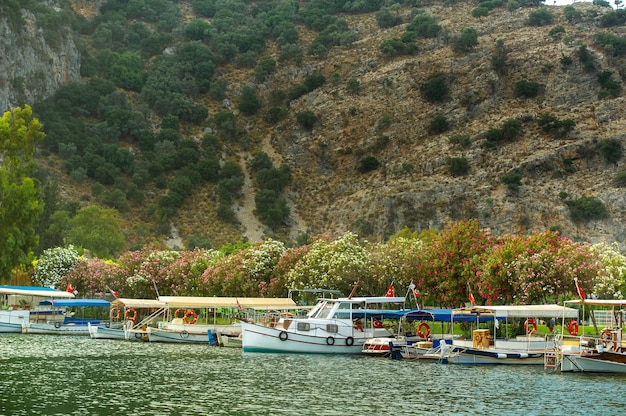 View of the embankment with boats and the canal in Dalyan.Turkey