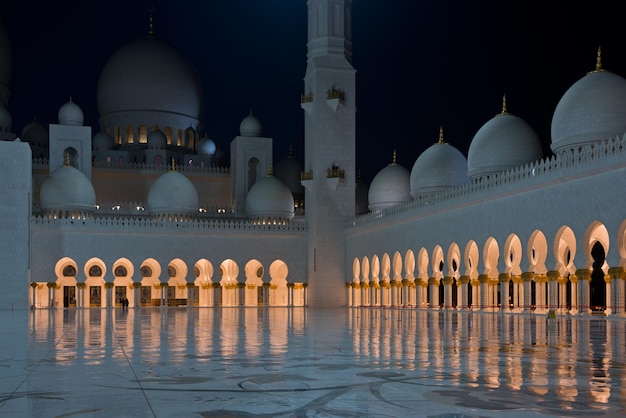 View of famous Sheikh Zayed White Mosque in Abu Dhabi, UAE at night