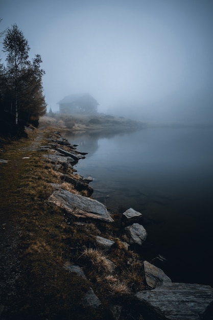 View  on foggy lake mortirolo in mountain