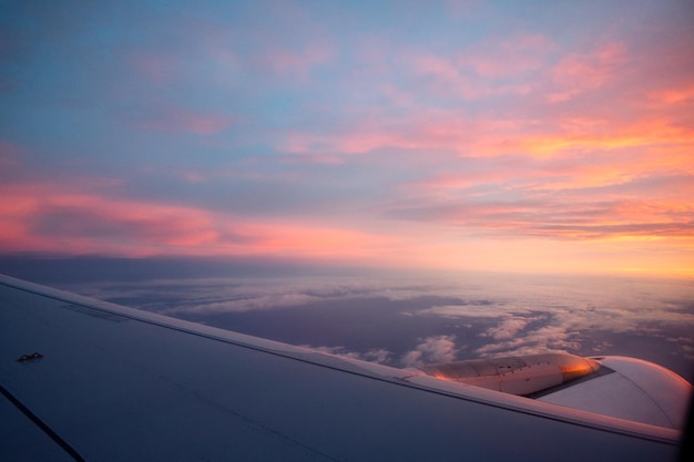 View from an airplane of a sunrise from the sky