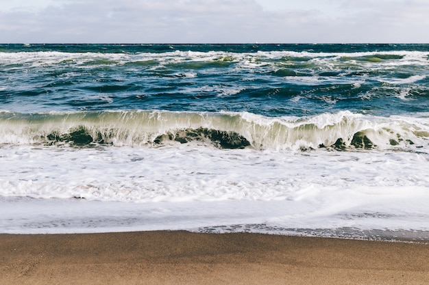 View from the beach on the  sea waves