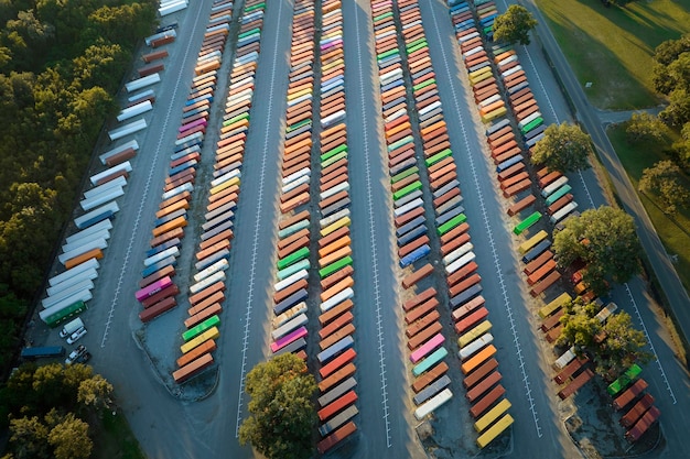 View from above of cargo container industrial yard with many shipment freight containers Concept of international delivery of goods