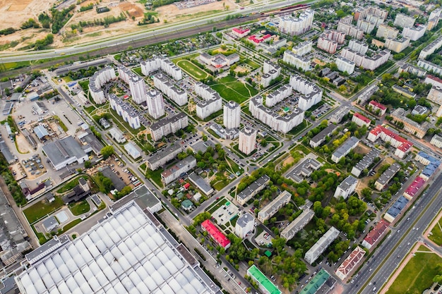 View from the height of an industrial plant and a residential complex in a residential area of Minsk,