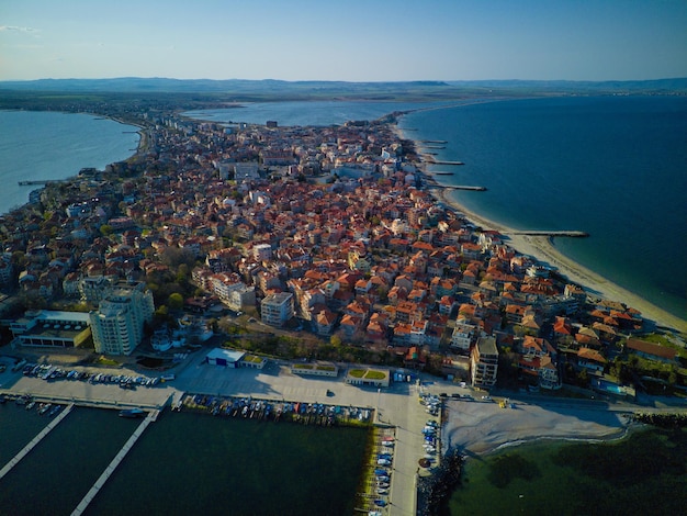 View from a height above the town of Pomorie with houses and streets washed by the Black Sea in Bulgaria