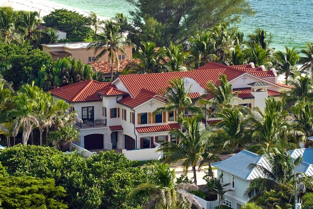 View from above of large residential houses in closed living golf club in south Florida American dream homes as example of real estate development in US suburbs