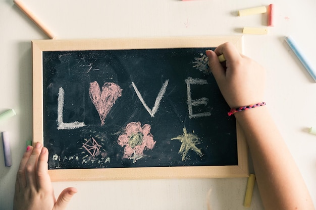 View from above of love message on chalkboard