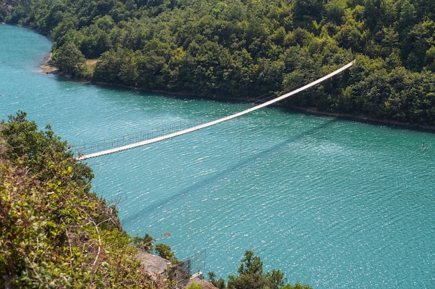 View from one of most beautiful roads in Albania along the Shkopet Lake precipitous soast Shkopet wooden pedestrian Bridge Lake Ulza Nature Park Diber County Balkan mountains Albania Europe