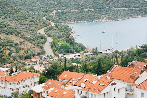 View from above on the red tiled roofs the resort town near the sea