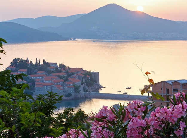 The view from the terrace at sunset over  Sveti Stefan sea islet