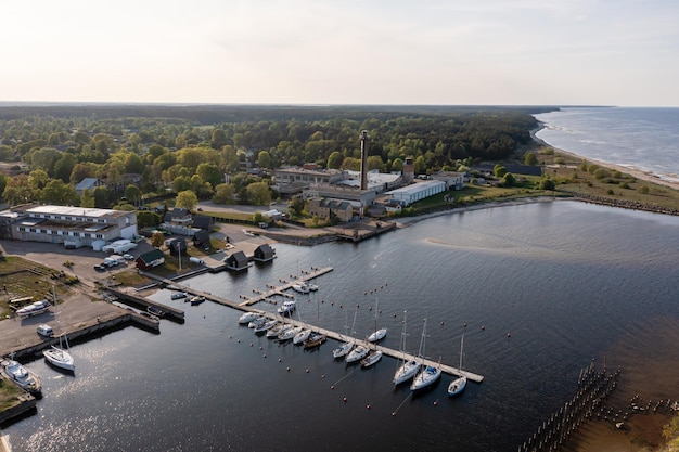 View from above of yachts at the pier of a seaside fishing village Engure Latvia