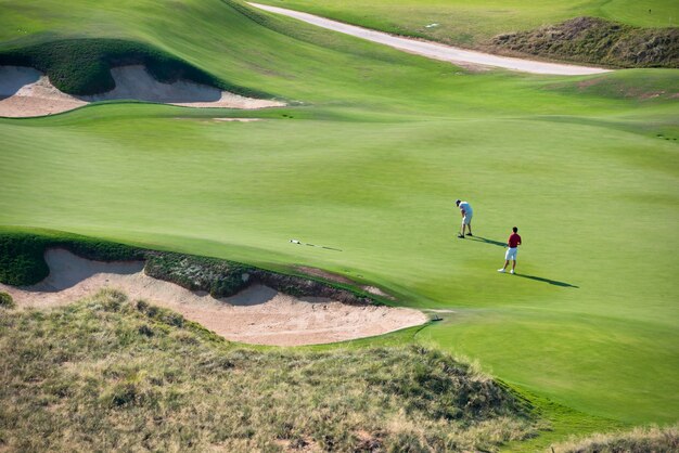 View of green golf resort field. summer vacations