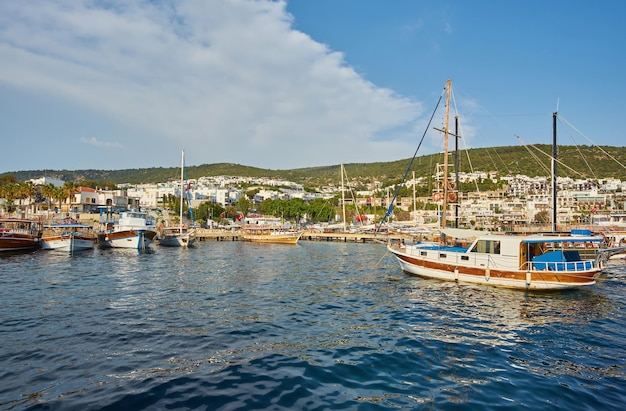 View of the Gumusluk Bodrum Marina sailing boats and yachts in Bodrum town city of Turkey