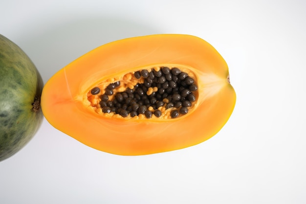 View of half cut papaya on white background generative AI