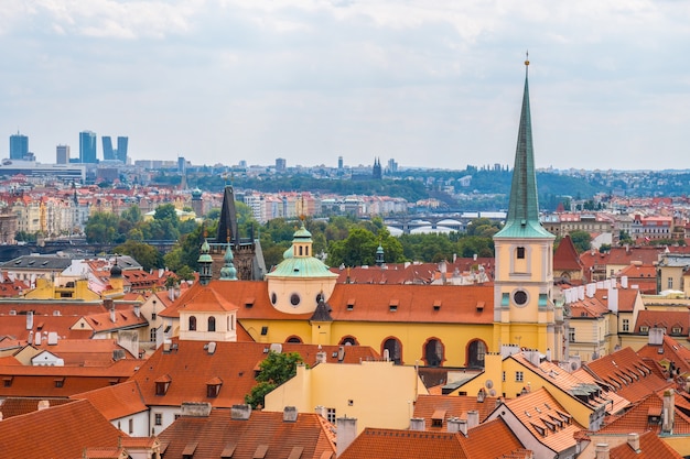 View over historic center of Prague with castle Prague city panorama, red roofs of Prague, Czech Republic.