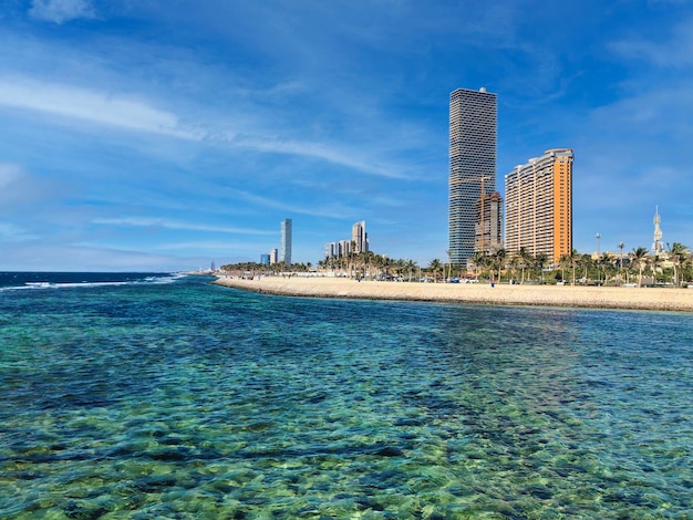 View of  Jeddah skyscrapers from the public beach Premium Photo