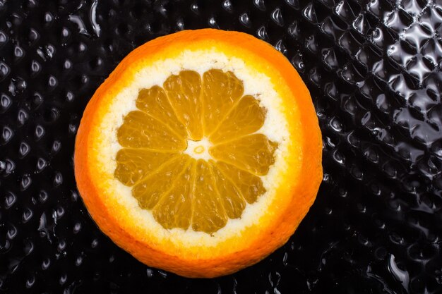 A view of a juicy sweet and ripe cut orange fruit