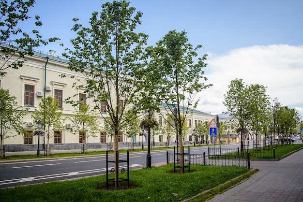 View of the Kremlin street with young trees on a sunny summer day