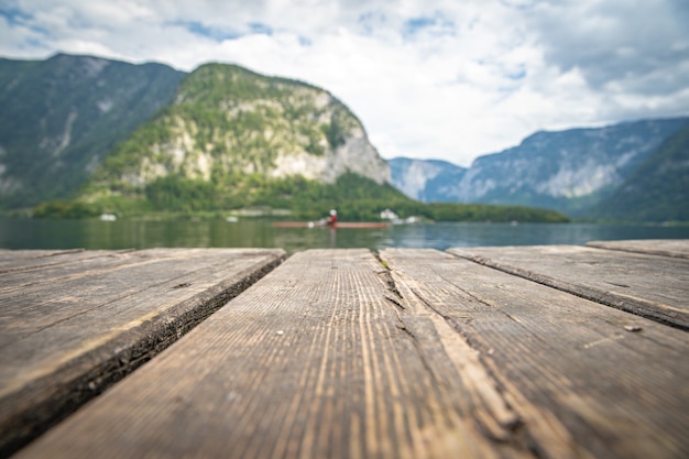 View on lake in austrian town hallstatt during tourist season in summer