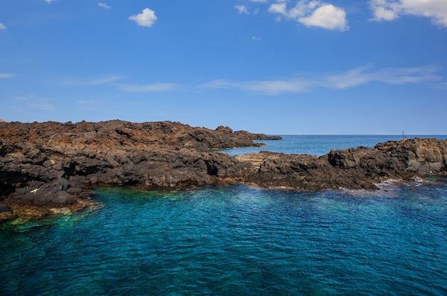 View of the lava beach of Linosa Called Mannarazza, Sicily. Italy