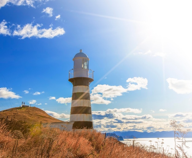 View of lighthousein sunny day on Kamchatka Peninsula