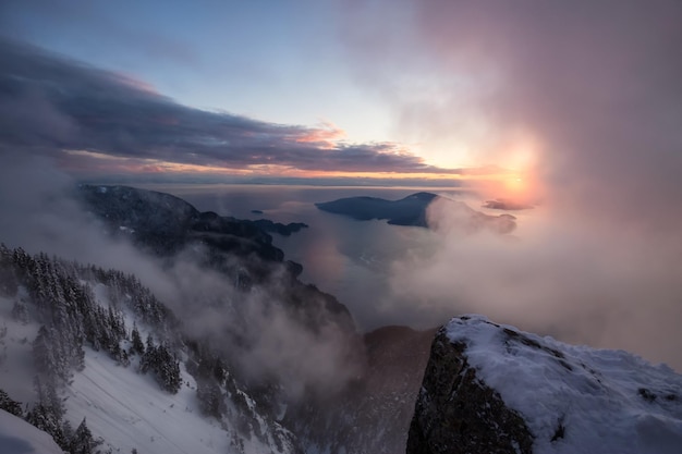 View looking down the cliff from the mountain overlooking Howe Sound