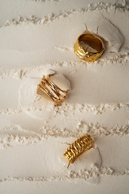 View of luxurious golden ring with white dust