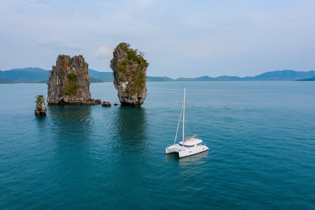 View of a luxury white yacht in the blue sea