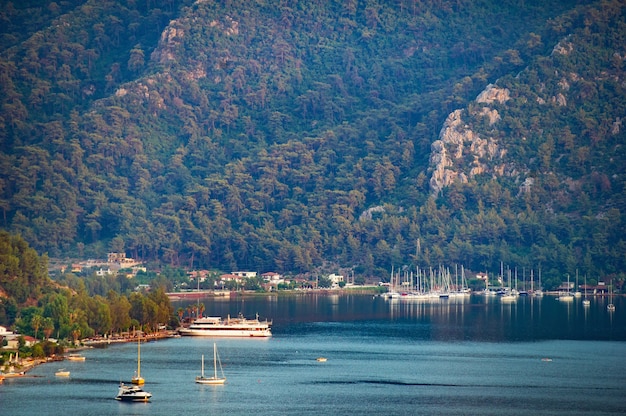 View  of many luxury boats and yachts at sunset in the mediterranean sea