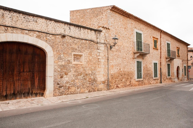 View of a medieval street of the picturesque Spanishstyle village Mancor de la Vall in Majorca or M