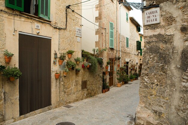 View of a medieval street of the picturesque Spanishstyle village Valdemossa in Majorca or Mallorca