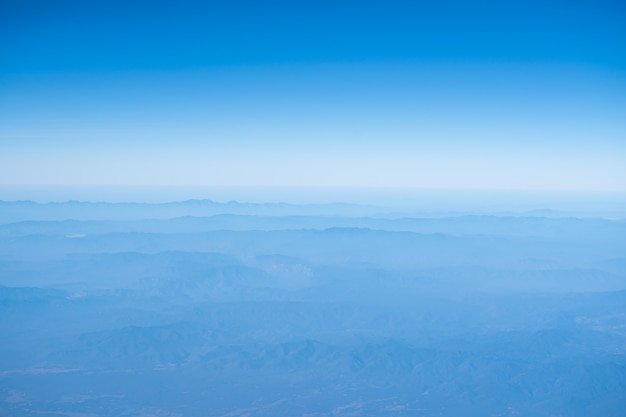 View of mountain and hill with blue sky in the morning.