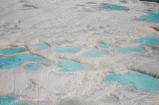 View of natural travertine pools and terraces in Pamukkale Cotton castle in southwestern Turkey