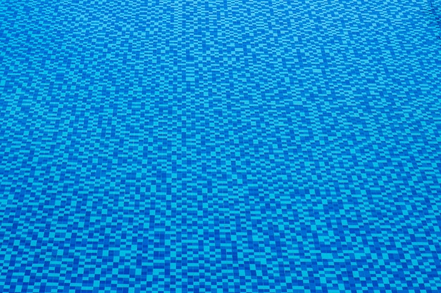 View of nice blue tile in swimming pool water surface