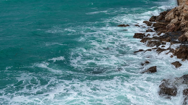 View of ocean waves and a fantastic rocky shore