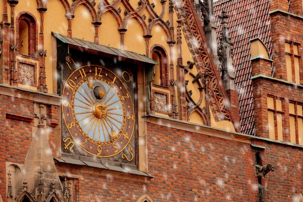 View on old clock in city hall in Wroclaw, Poland