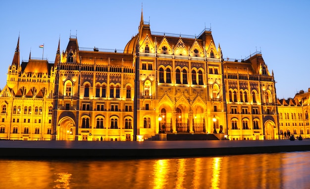 View on old illuminated building at waterfront