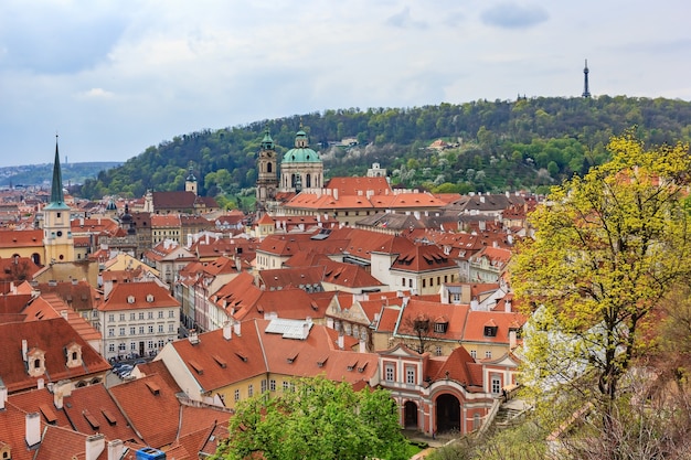 View of the Old Town pier architecture and traditional red roofs in Prague, Czech Republic