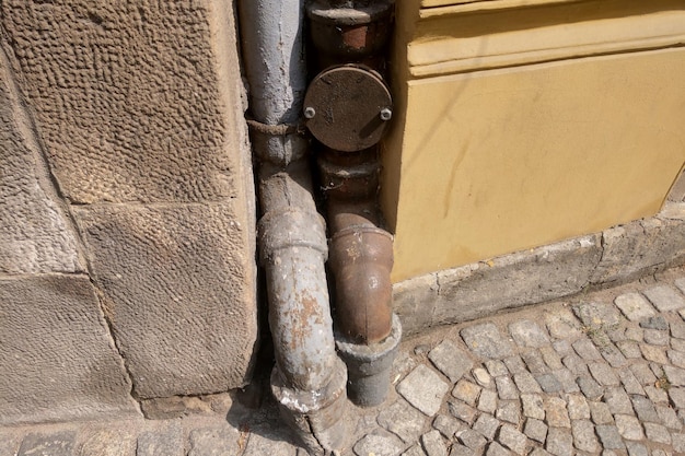 View of the old wastewater pipes of the building the structure of the metal