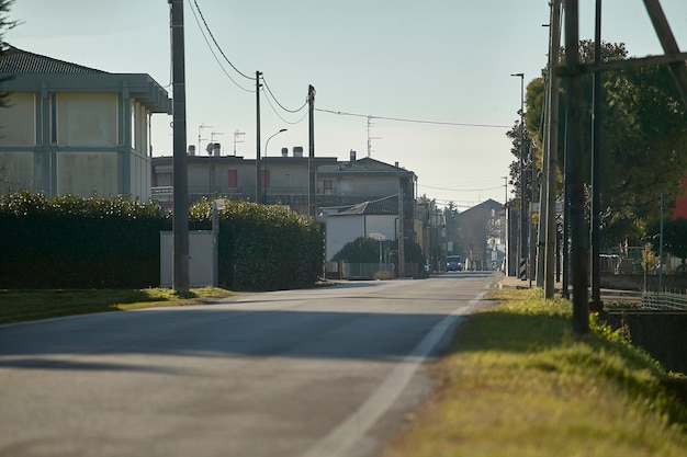 View of the panorama of an empty street in the center of a small village in northern Italy.